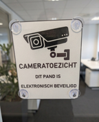 Cameratoezicht Bord Raam